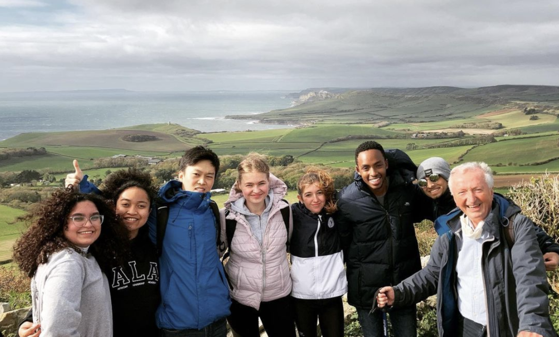 First-year international students in F&M's Bath cohort hiking along the Dorset coastline