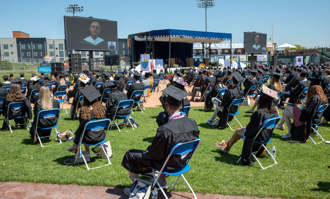 Members of the Class of 2021 watch speaker Jim Stengel '77 during F&M Commencement held May 15 at Lancaster Clipper Stadium.