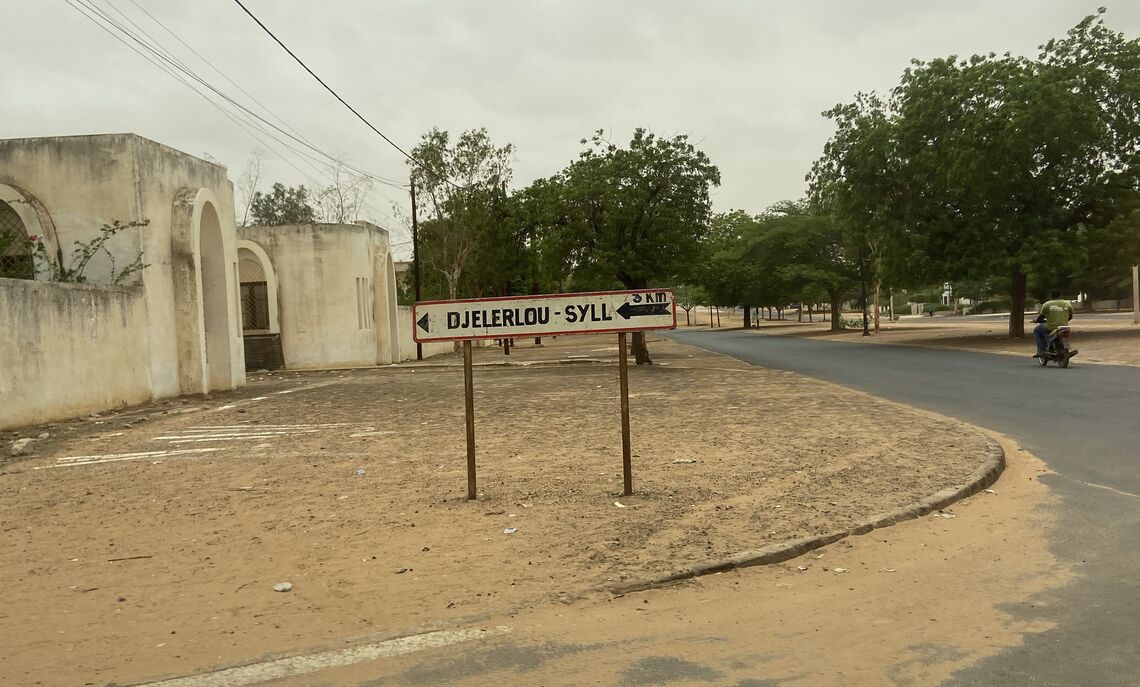 A local village sign in Louga, Senegal where a depot is located.