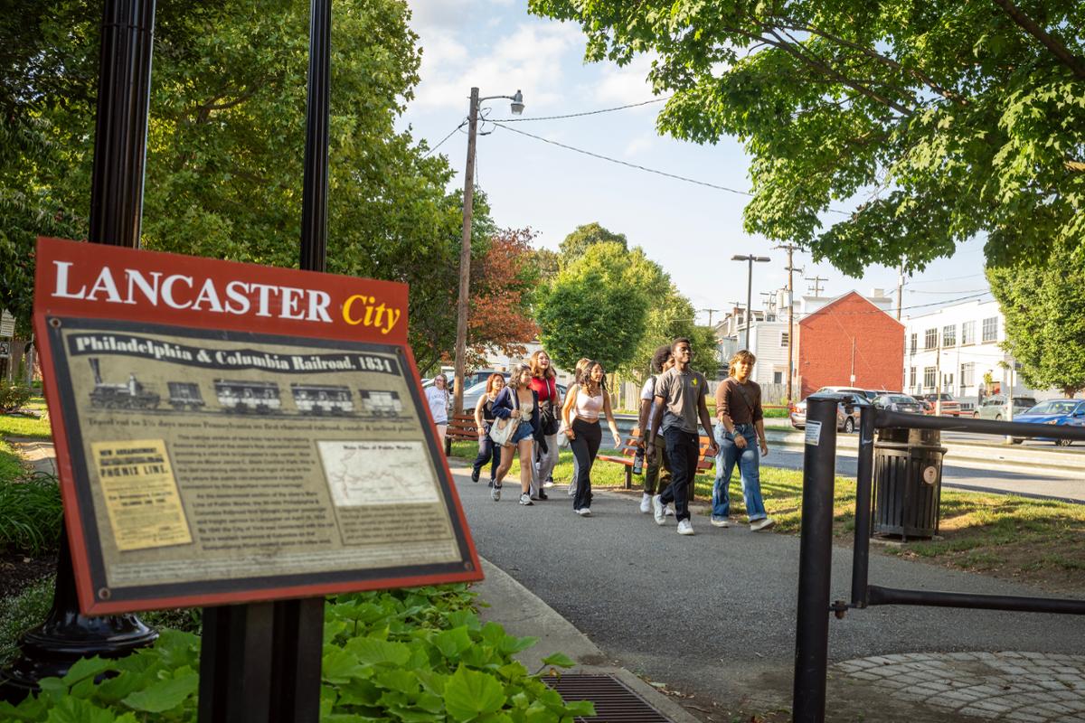 Students walk to First Friday