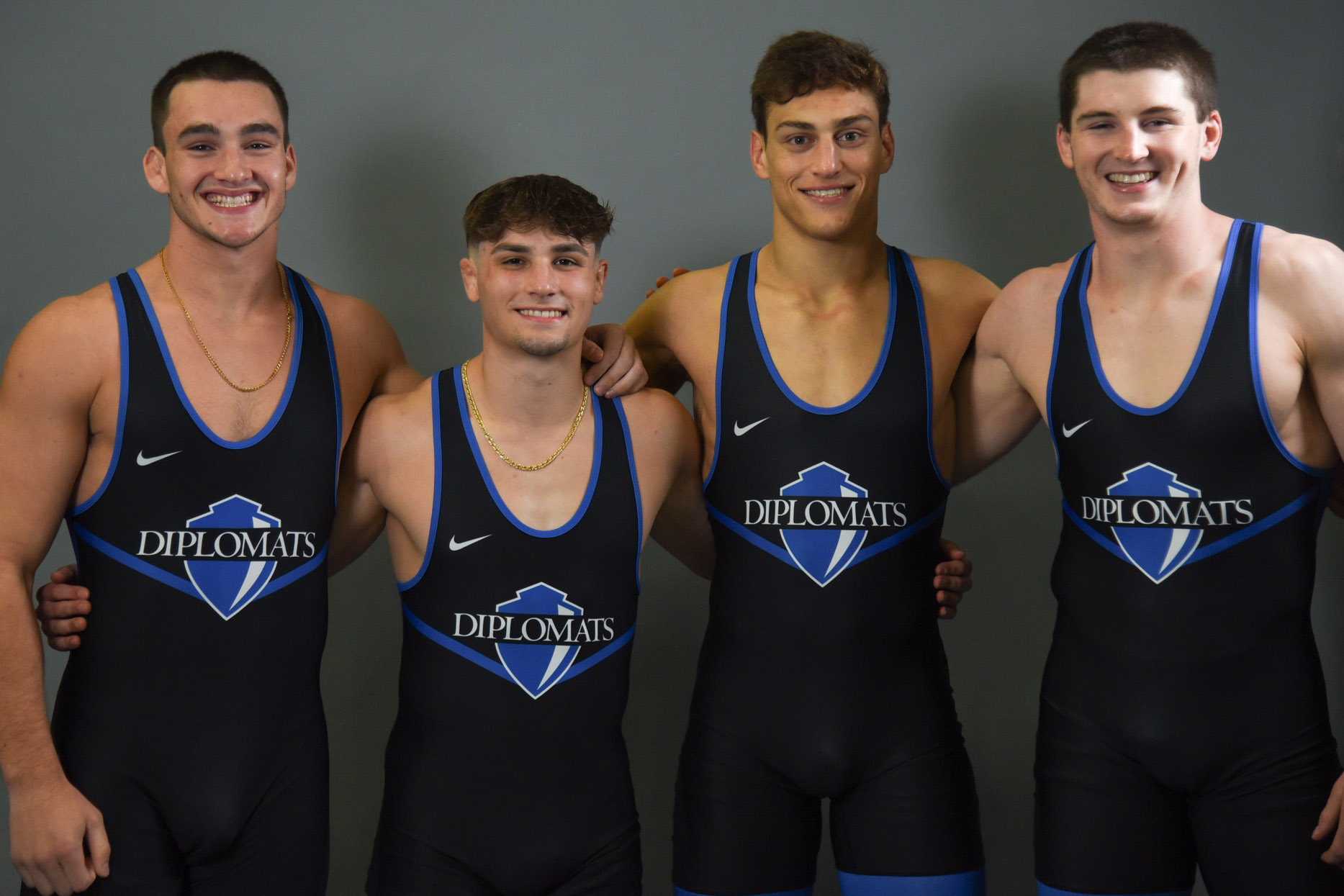 2023-2024 Wrestling Captains John Crawford, Pat Phillips, Noah Fox, James Conway