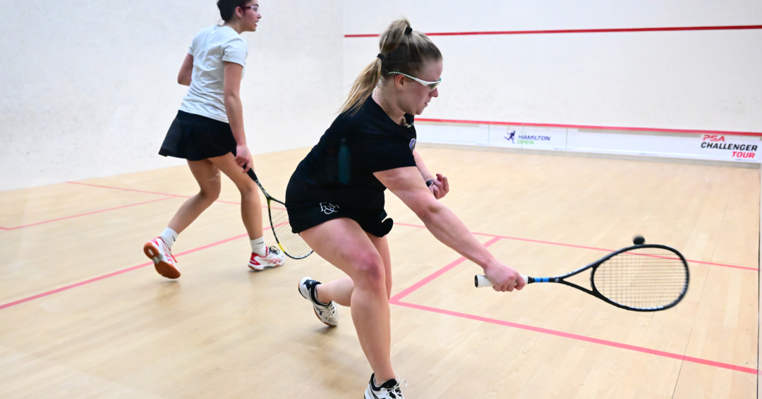 A photo of squash players during the Diplomats vs. Wesleyan.