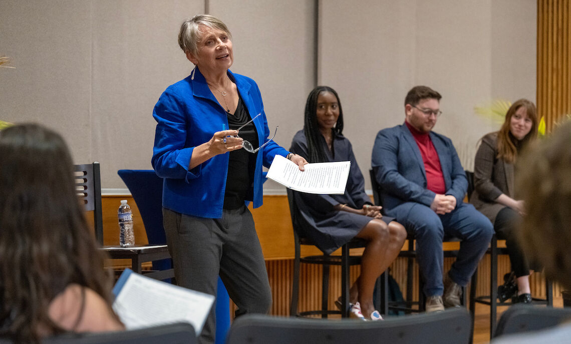 President Barbara Altmann moderates a young alumni panel in Stahr Auditorium.