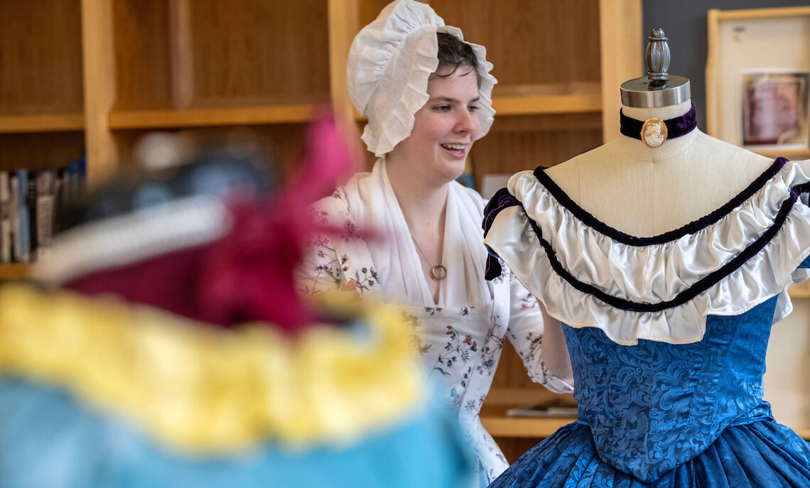 Rachel Sheffield '20, lead interpreter and historic clothing coordinator at First State Heritage Park in Dover, Del., presented her designs to students in Brooks College House.