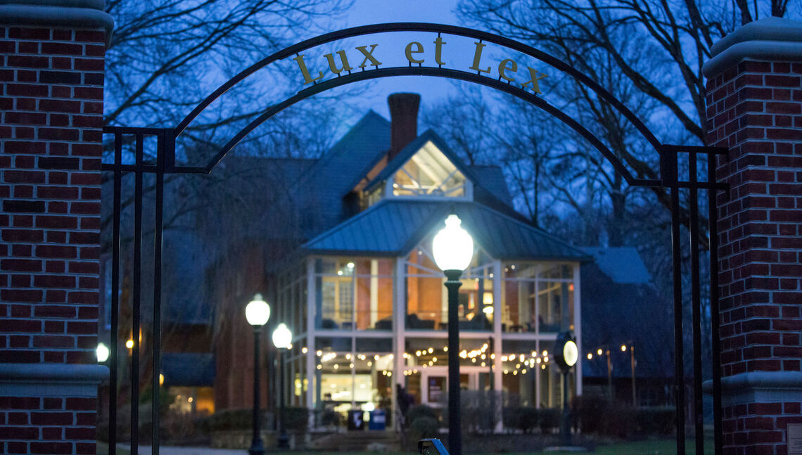 Students gather in the warm glow of Blue Line cafe during an evening in early March.