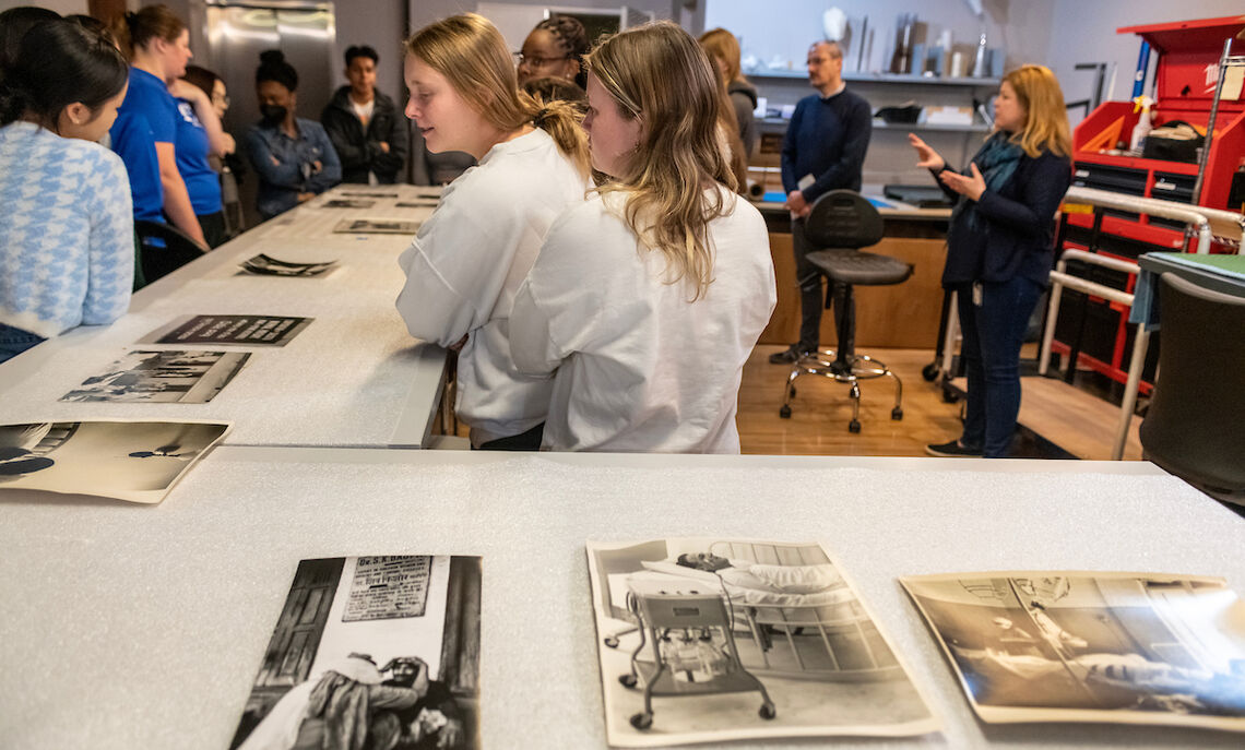 Students in Professor Di Giulios Narratives of Disability: course examine a series of photos from the Phillips Museum collection that depict disability.