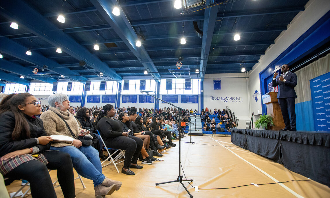 Yusef Salaam, poet, activist and inspirational speaker, addresses the crowd during Common Hour at Mayser Gymmnasium.