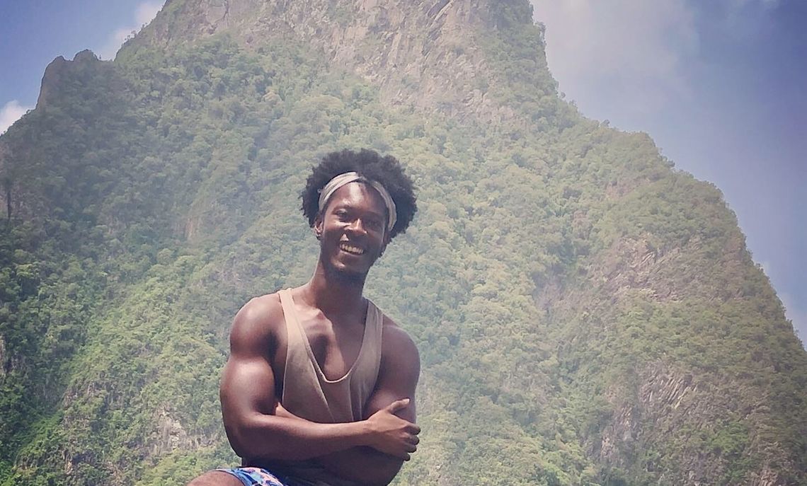 Glover in front of the Gros Piton mountain in St. Lucia