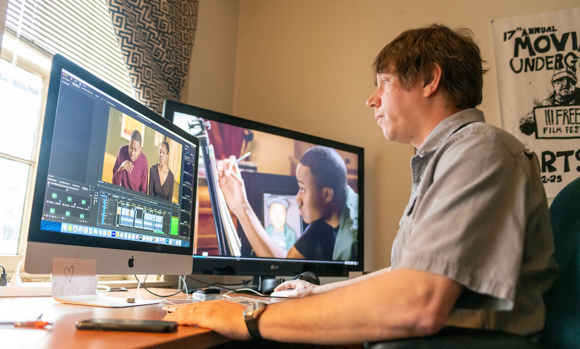 On the editing screen is one of the film's featured artist Malcolm Corley whose paintings exhibited recently at the Art of the State in Harrisburg.