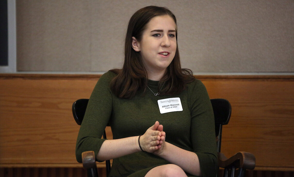 Allison Maxwell '20, sister of Erin Maxwell '23, speaks at a campus event.