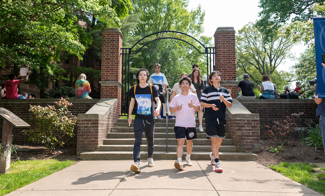 Graduating seniors take a final stroll through campus as members of the Franklin & Marshall community join them to celebrate their four years of achievement.