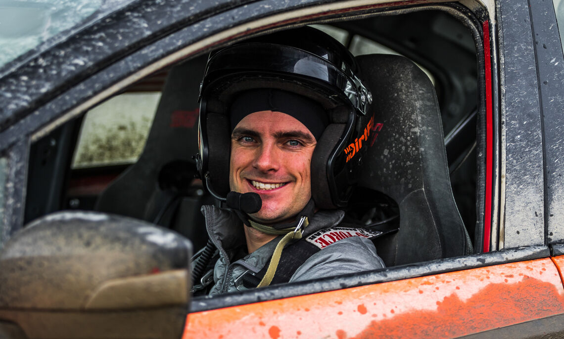 Greg Duckloe '13 during a staging stop while driving a heavily modified Subaru WRX STI at DirtFish, a rally school in Snoqualmie, Wash.