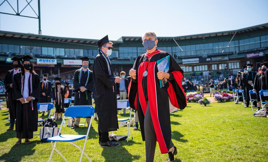 F&M President Barbara Altmann makes her way to the podium during F&M Commencement held May 15 at Lancaster Clipper Stadium.