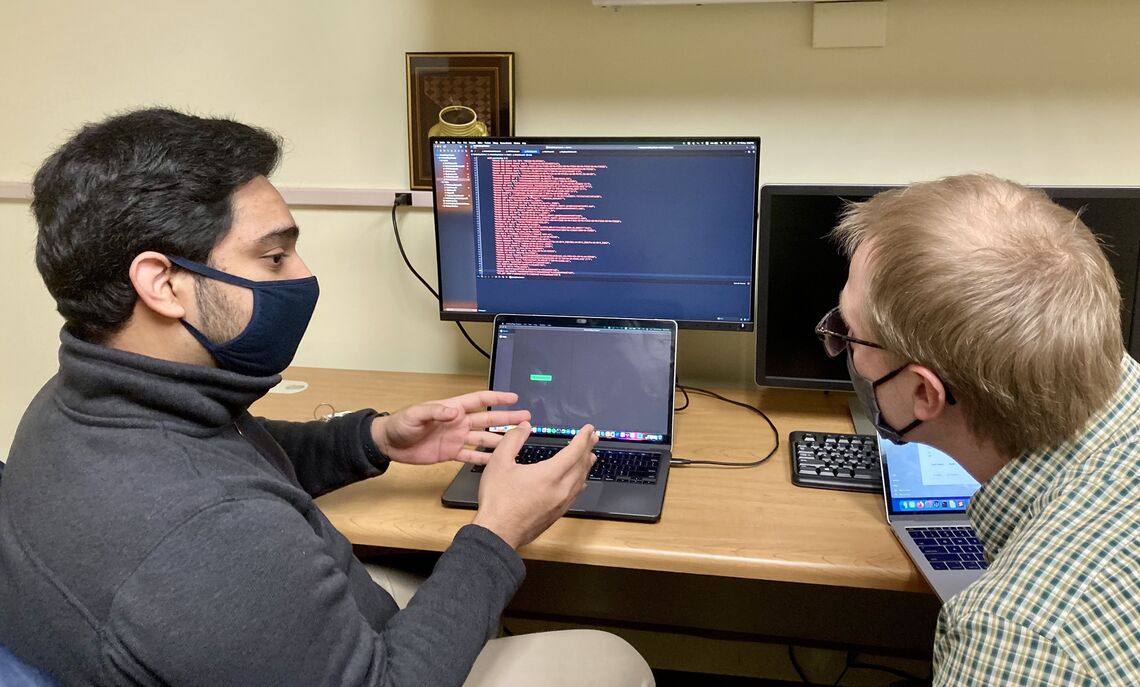 Saad Mahboob '22 and Ed Novak, assistant professor of computer science.