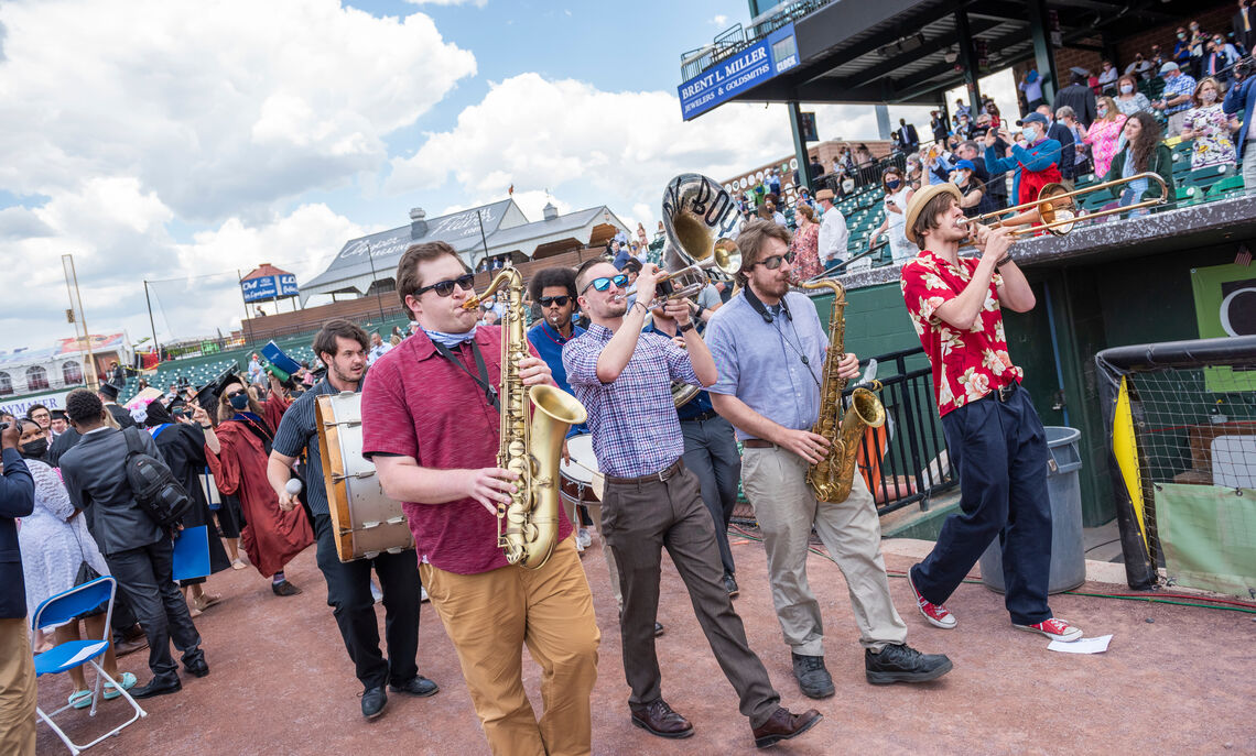 In a festive ceremony finale, Big Boy Brass music ensemble plays at F&M 2021 Commencement held May 15 at Clipper Stadium.