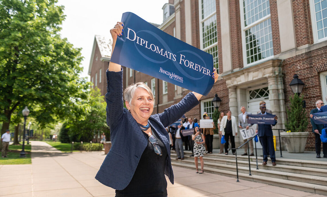 Graduating seniors take a final stroll through campus as members of the Franklin & Marshall community join them to celebrate their four years of achievement.