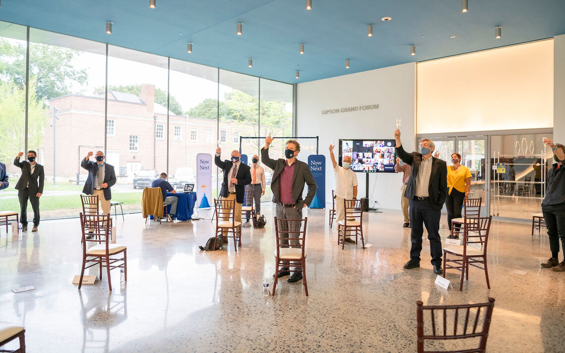 Guests raise their glasses in honor of the opening of the Susan and Benjamin Winter Visual Arts Center at Franklin & Marshall College.