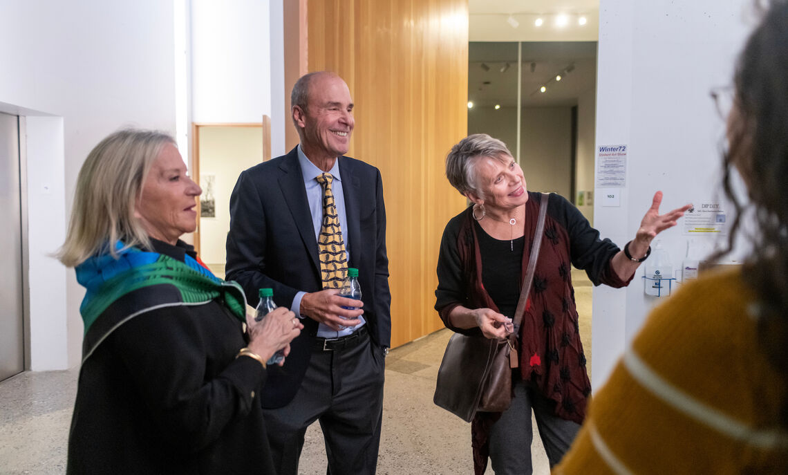 Bonnie Winter, Doug Winter '72 and Franklin & Marshall College President Barbara K. Altmann peruse the student artwork at the Winter72 Student Art Show in the Susan and Benjamin Winter Visual Arts Center.