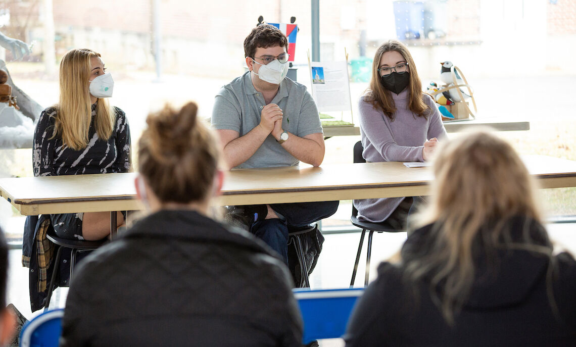 A panel featuring the students who collaborated on the curation share their thoughts on welcoming migrants.