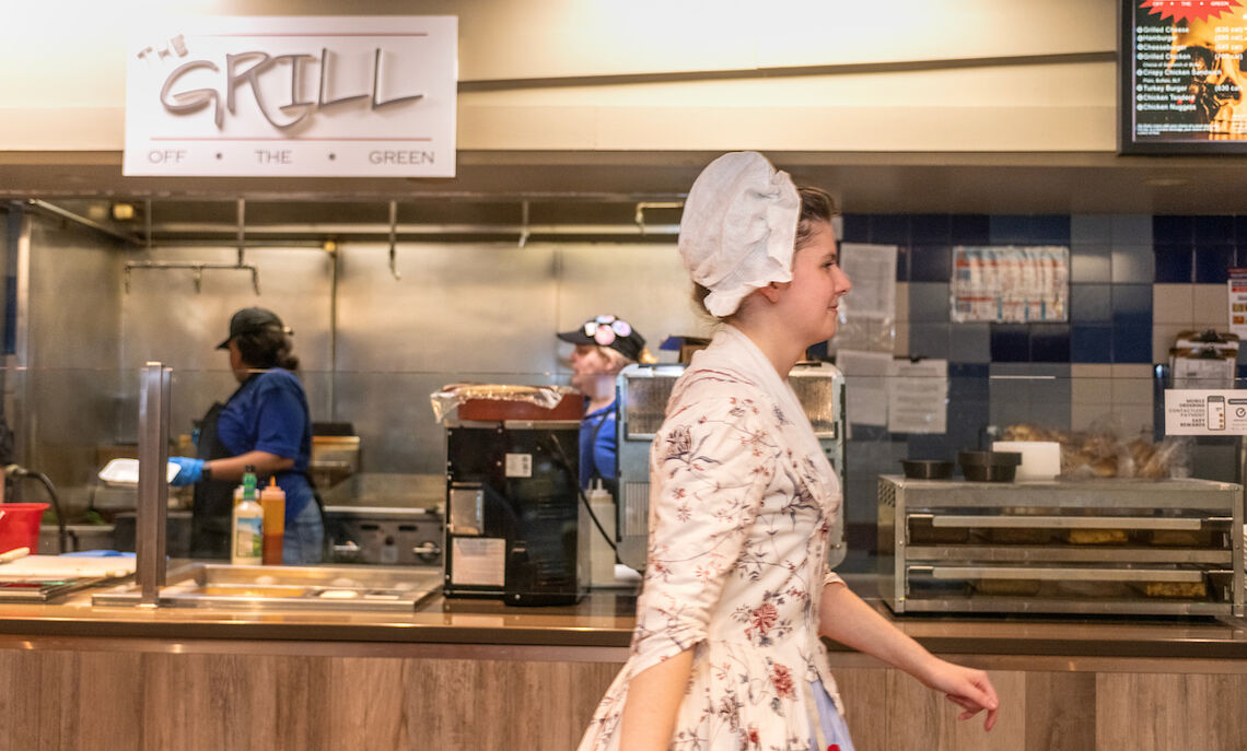 Colonial girl in a modern world: Historic clothing designer Rachel Sheffield '20 visits the F&M Dining Hall.